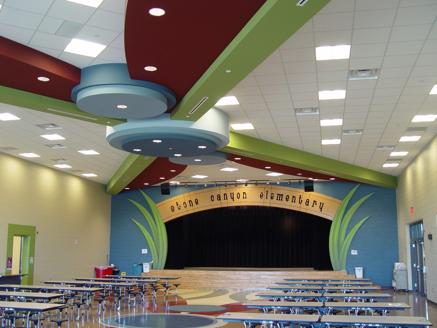 Cafetorium and stage interior at Stone Canyon Elementary School
