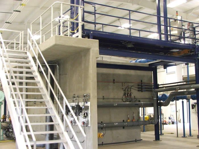 Industrial filter press equipment with elevated platform and stairs